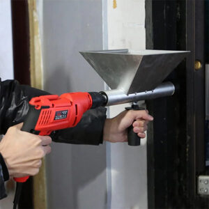 a picture for the cement caulking gun attached to a drill and stuffing cement between 2 gaps
