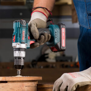 A man using Ronix Cordless drill