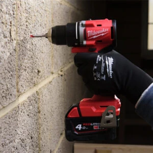 A man using the general gloves with the power tools milwaukee