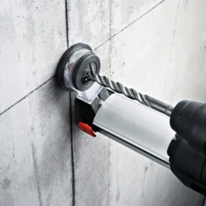 Heavy-duty power drill with a masonry bit for drilling into concrete and brick surfaces.