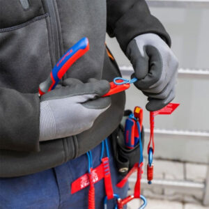 Protective work gloves and safety tools from SAKR Building Materials, ideal for construction and ele.