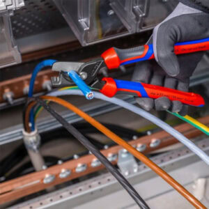 Heavy-duty wire stripping tool by SAKR Building Materials for electrical work.