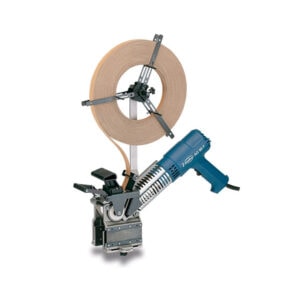 Electric drywall cutting tool with adjustable blade for construction use.