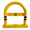 Heavy-duty yellow safety barrier with black stripes for construction sites.