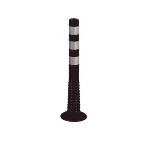 Black and white striped safety bollard for construction sites and traffic management.