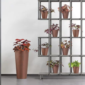 Corten round flowerpot by Prosperplast, ideal for outdoor garden decor.