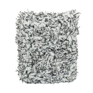 Insulation material with shredded fibers for building insulation purposes.