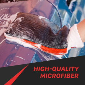 Microfiber cleaning cloth wiping a glass surface for streak-free shine.
