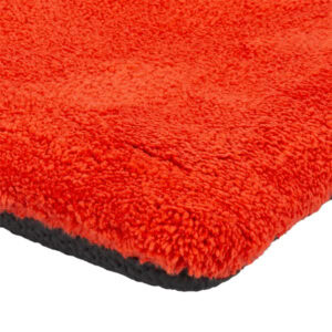 Soft red carpet with plush texture, ideal for building interiors and event spaces.