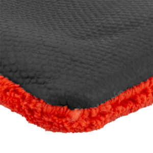 Black and red textured carpet mat, ideal for construction and building material applications.