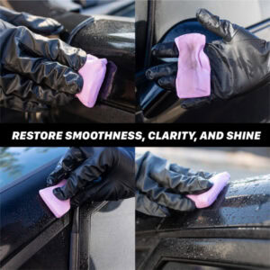 Car polishing and detailing with a purple applicator pad for shine and protection.