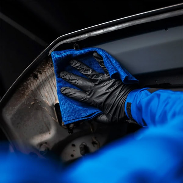Industrial cleaning of building materials using professional tools and techniques.