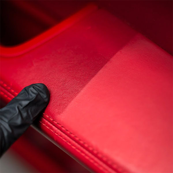 Red leather surface, high-quality material for building projects and decor.